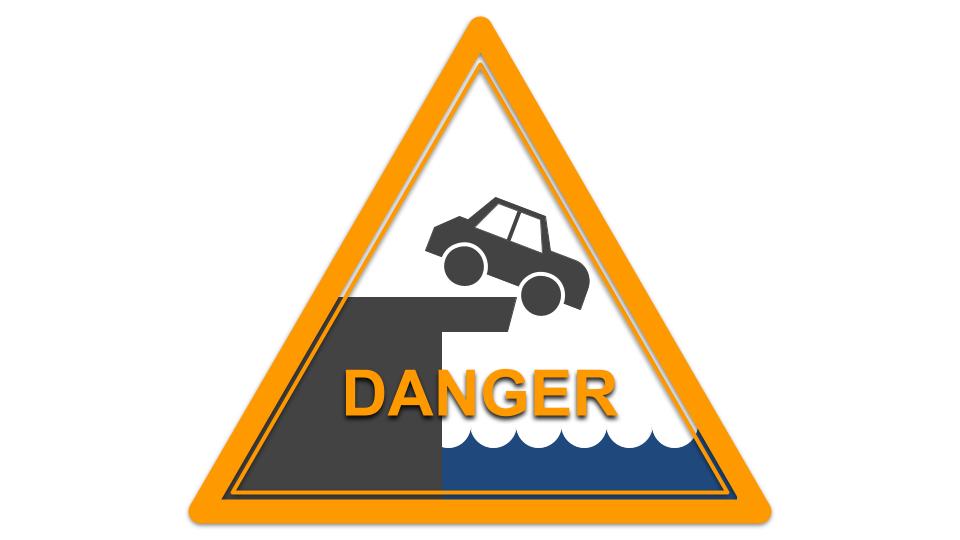 A road sign, "DANGER," showing a bridge out.